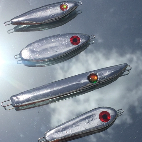 Chrome slab spoons used for vertical jigging striped bass on Lake Texoma